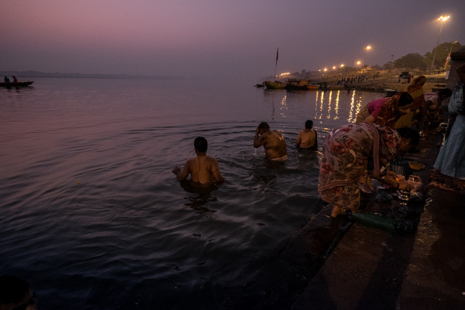 Pilgrims taking a sacred bath India