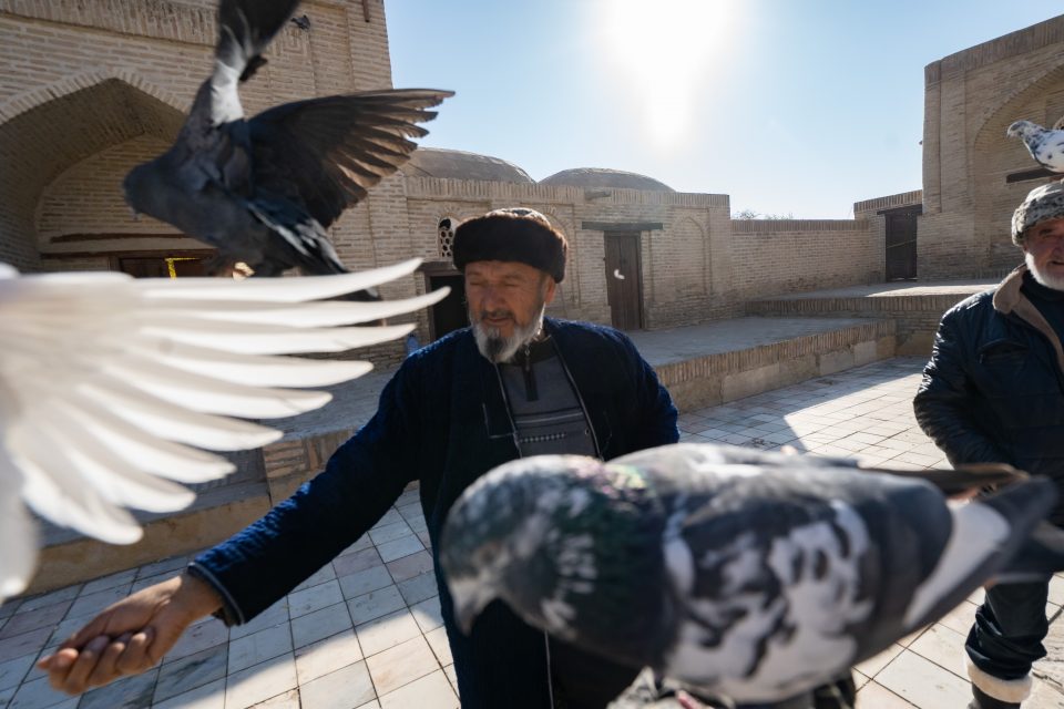 Doves and a priest in Uzbekistan